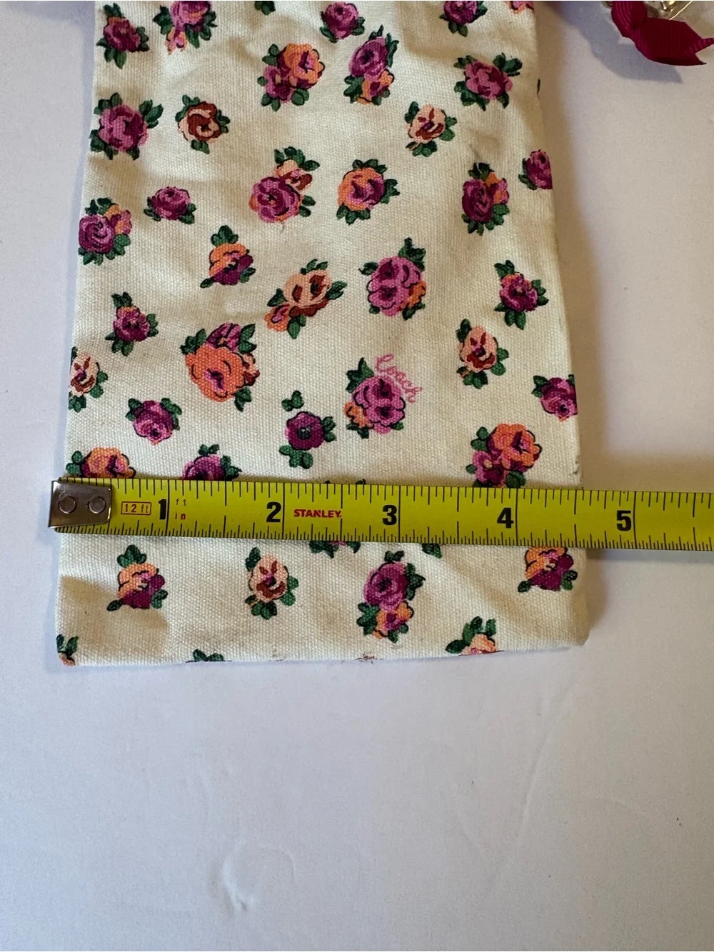 Coach Floral Drawstring Pouch in Cream with Pink & Orange Roses